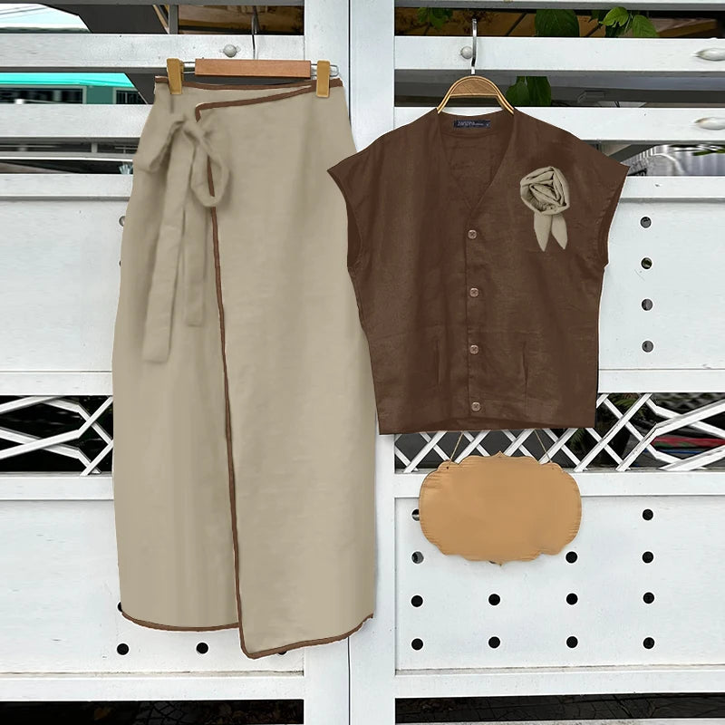 Brown skirt and sleeveless top with a matching bag on a white background