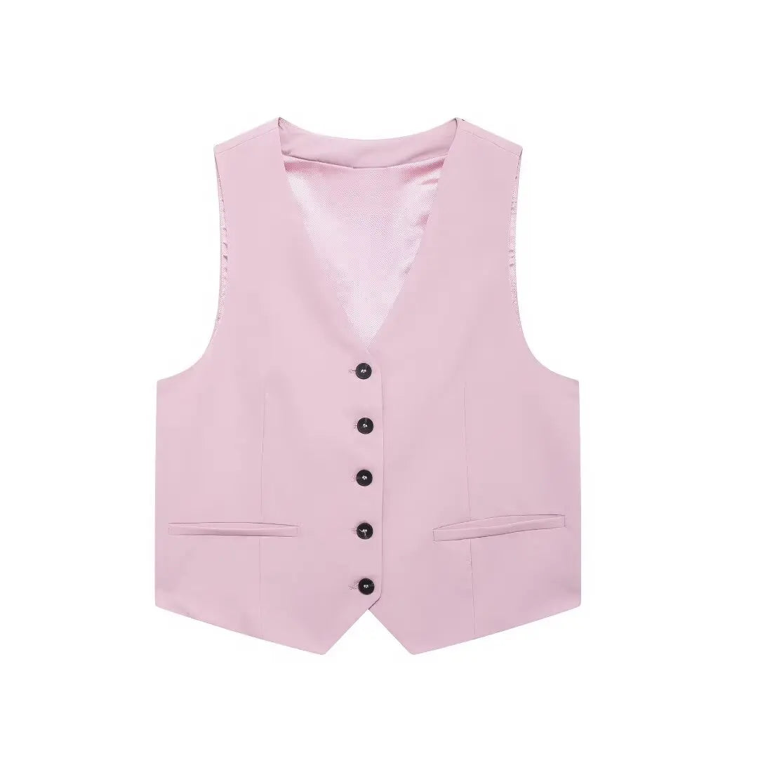 Pink vest with black buttons on a white background