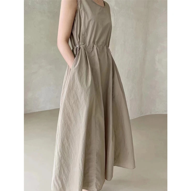 Beige dress on a plain background