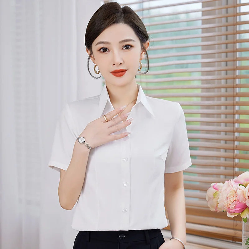 Woman wearing a white shirt with a blurred background