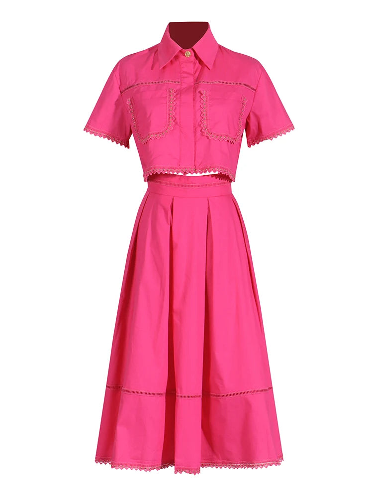 Pink dress with short sleeves and a full skirt on a white background