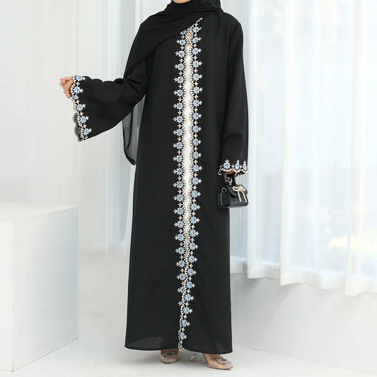 Black abaya with white embroidery on a white background