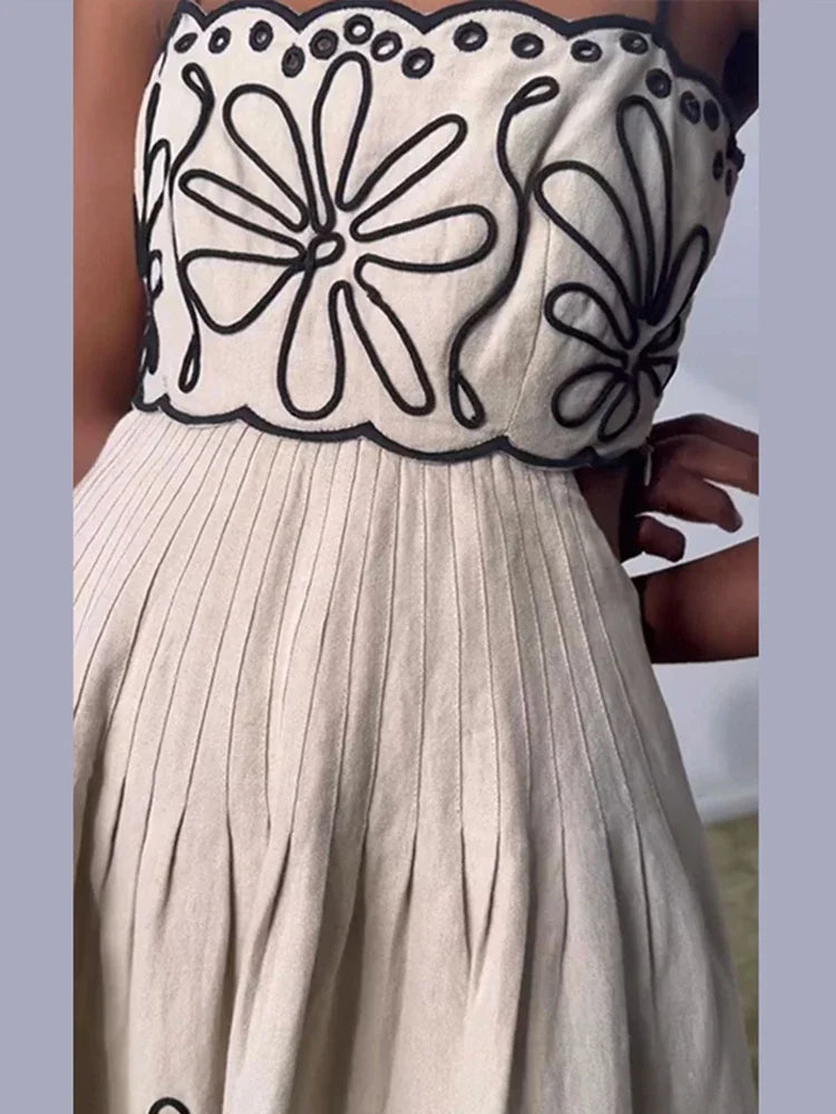 Sexy Hollow Out Backless Sleeveless Wave Hem Dress