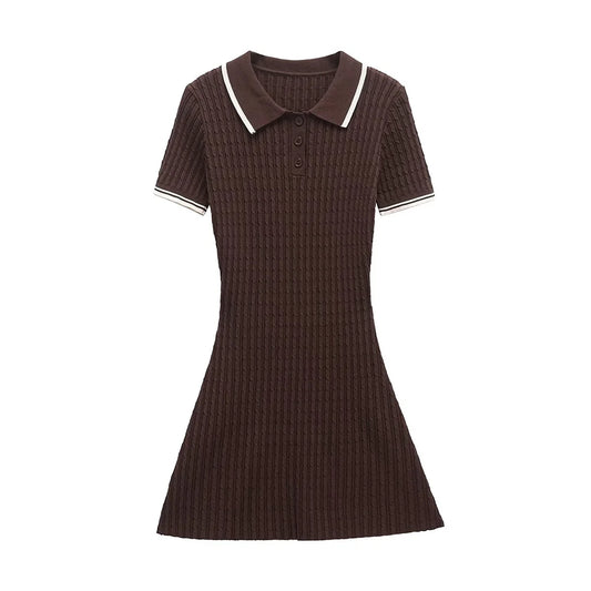 Brown ribbed dress with white trim on a white background