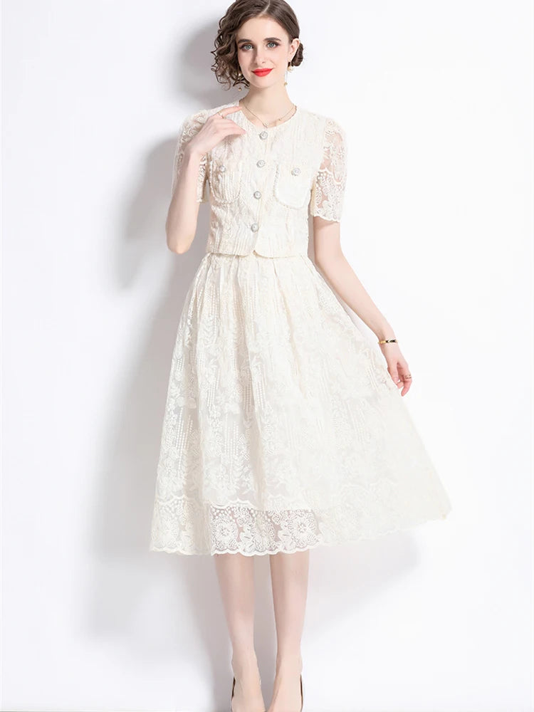 Woman wearing a white lace dress on a white background