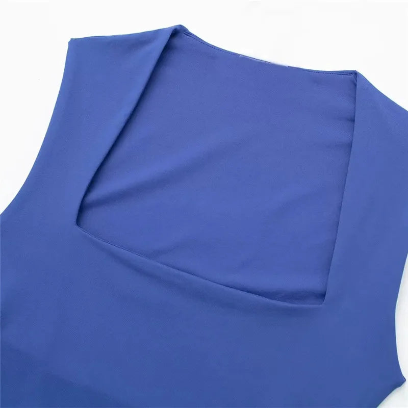 Blue fabric with a subtle pattern on a white background