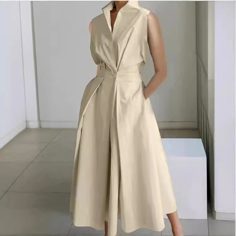 Beige sleeveless dress worn by a person in an indoor setting